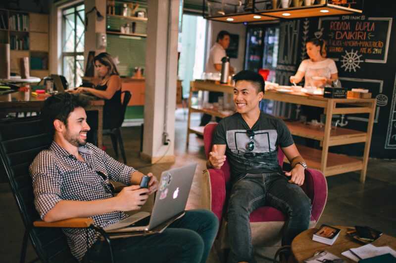 4 Mental Health Hacks Remote WordPress Professionals Can Start Right Now! 5 two men talking in a cafe